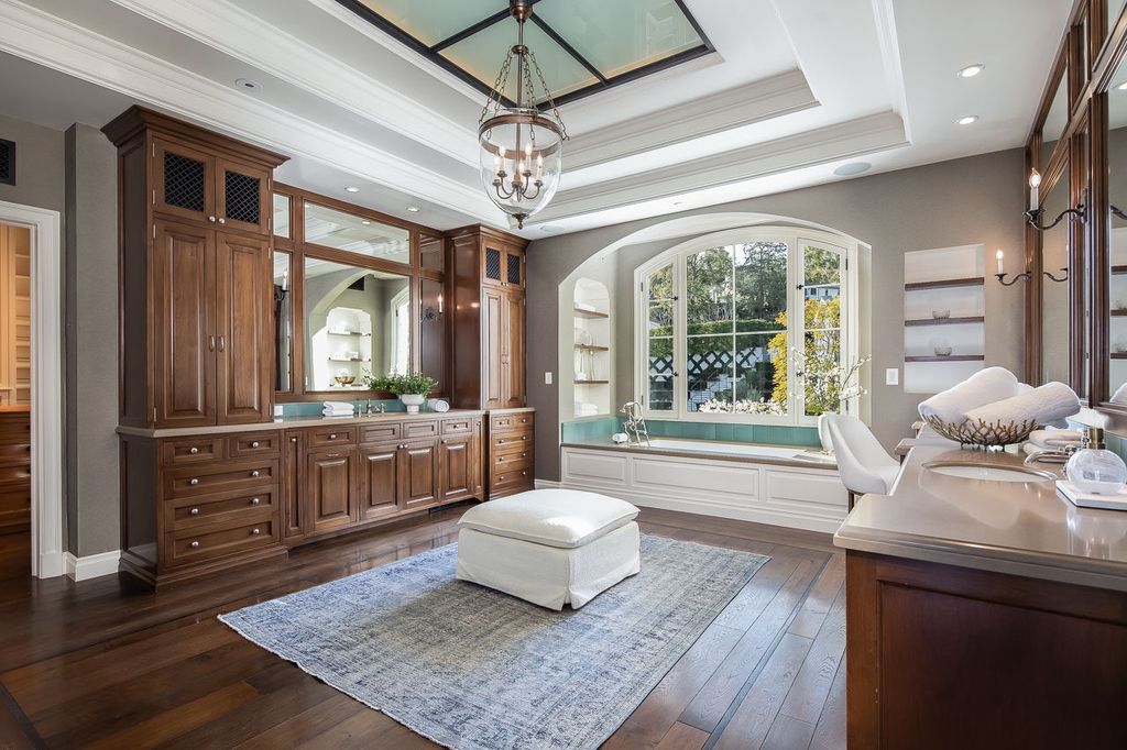This stunning estate located at 1678 Alta Mura Rd in Pacific Palisades, California 90272, is a true gem of the Palisades Riviera. Boasting 8 bedrooms, 14 bathrooms, and a living space of 16,000 square feet on a 1.08-acre lot, this LEED-certified compound offers luxury and privacy in an unbeatable location.