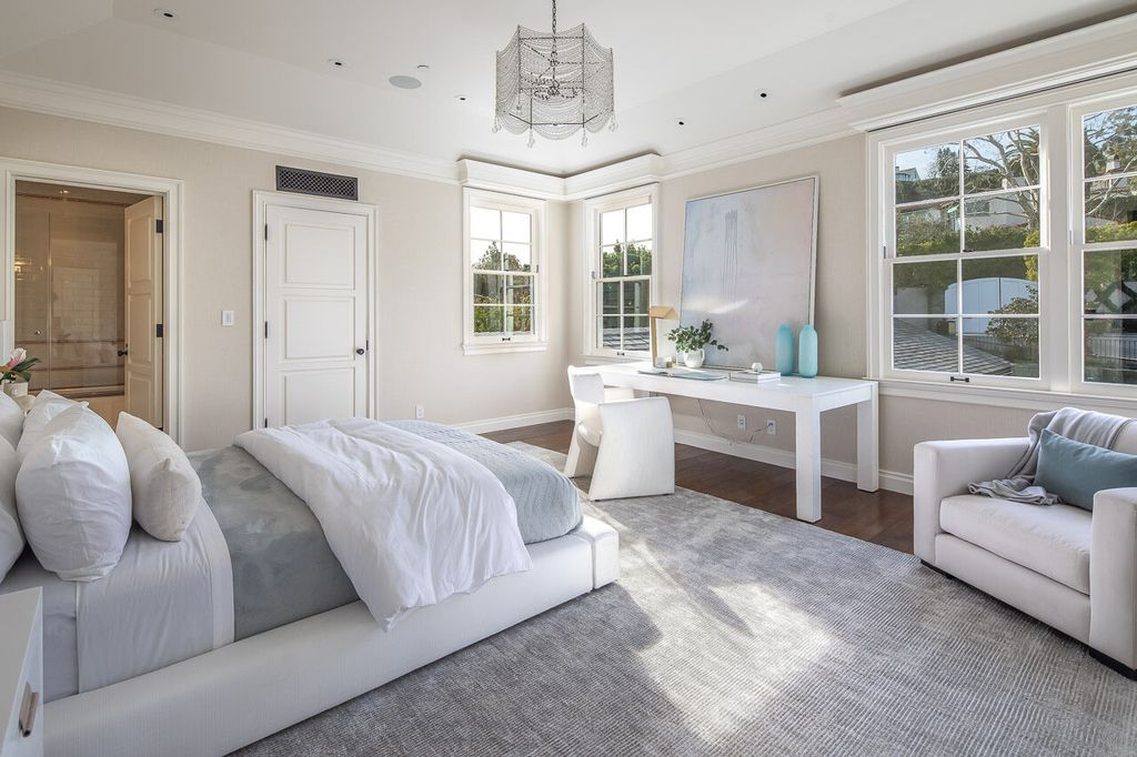 This stunning estate located at 1678 Alta Mura Rd in Pacific Palisades, California 90272, is a true gem of the Palisades Riviera. Boasting 8 bedrooms, 14 bathrooms, and a living space of 16,000 square feet on a 1.08-acre lot, this LEED-certified compound offers luxury and privacy in an unbeatable location.
