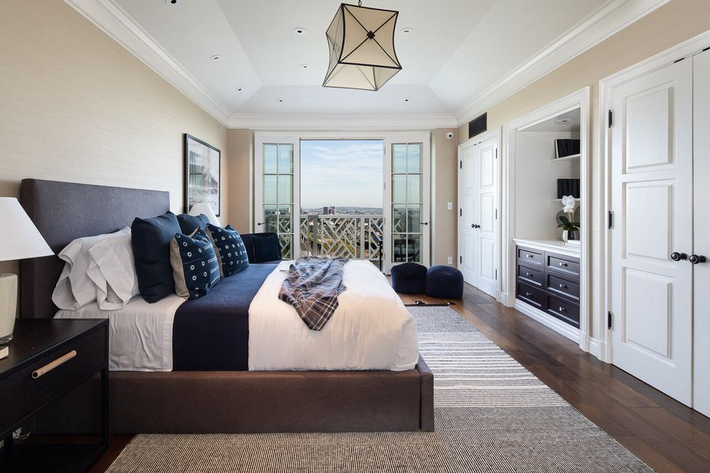 This stunning estate located at 1678 Alta Mura Rd in Pacific Palisades, California 90272, is a true gem of the Palisades Riviera. Boasting 8 bedrooms, 14 bathrooms, and a living space of 16,000 square feet on a 1.08-acre lot, this LEED-certified compound offers luxury and privacy in an unbeatable location.