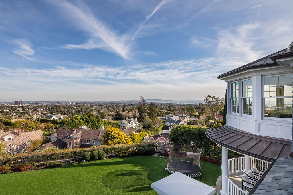 This stunning estate located at 1678 Alta Mura Rd in Pacific Palisades, California 90272, is a true gem of the Palisades Riviera. Boasting 8 bedrooms, 14 bathrooms, and a living space of 16,000 square feet on a 1.08-acre lot, this LEED-certified compound offers luxury and privacy in an unbeatable location.