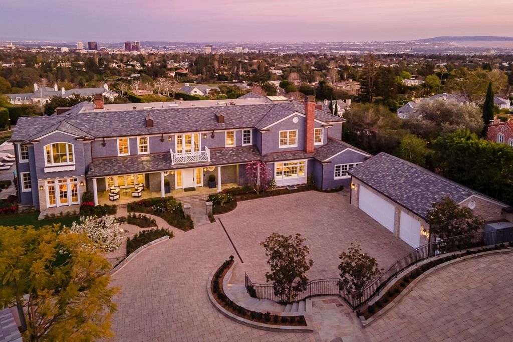 This stunning estate located at 1678 Alta Mura Rd in Pacific Palisades, California 90272, is a true gem of the Palisades Riviera. Boasting 8 bedrooms, 14 bathrooms, and a living space of 16,000 square feet on a 1.08-acre lot, this LEED-certified compound offers luxury and privacy in an unbeatable location.