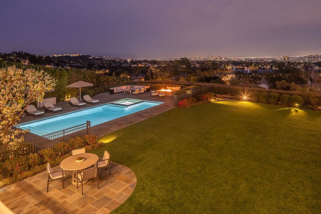 This stunning estate located at 1678 Alta Mura Rd in Pacific Palisades, California 90272, is a true gem of the Palisades Riviera. Boasting 8 bedrooms, 14 bathrooms, and a living space of 16,000 square feet on a 1.08-acre lot, this LEED-certified compound offers luxury and privacy in an unbeatable location.
