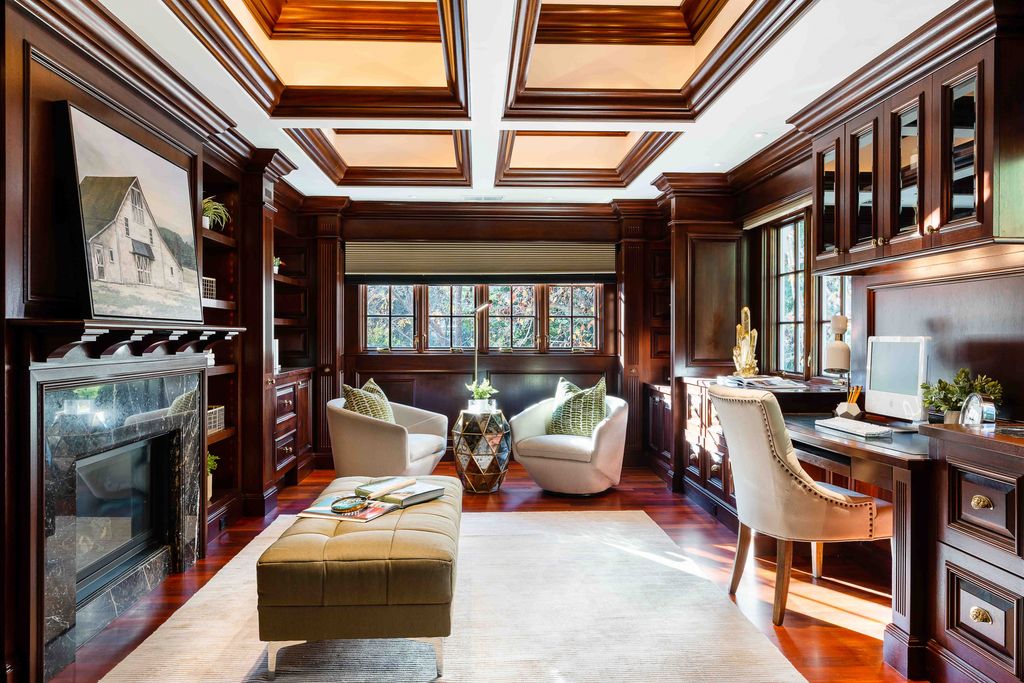 18 Cowell Lane Home in Atherton, California. Indulge in the perfect blend of privacy and luxury within the serene surroundings of this magnificent Atherton estate. Nestled on over an acre of meticulously maintained grounds, this exceptional home exudes style and elegance at every turn, boasting over 6,800 square feet of living space. Impeccable craftsmanship is showcased throughout, with exquisite details including stone, marble, and mahogany finishes. 