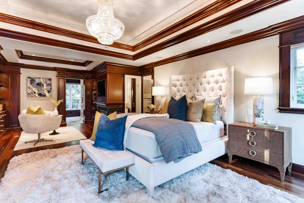 18 Cowell Lane Home in Atherton, California. Indulge in the perfect blend of privacy and luxury within the serene surroundings of this magnificent Atherton estate. Nestled on over an acre of meticulously maintained grounds, this exceptional home exudes style and elegance at every turn, boasting over 6,800 square feet of living space. Impeccable craftsmanship is showcased throughout, with exquisite details including stone, marble, and mahogany finishes. 