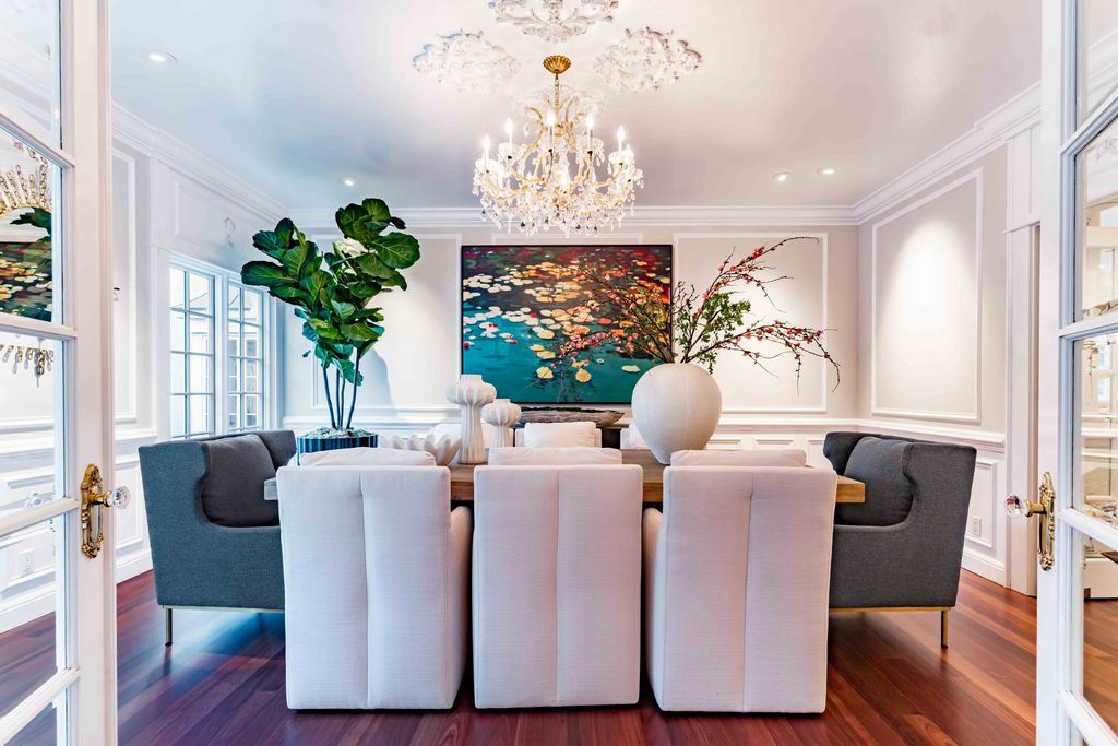 18 Cowell Lane Home in Atherton, California. Indulge in the perfect blend of privacy and luxury within the serene surroundings of this magnificent Atherton estate. Nestled on over an acre of meticulously maintained grounds, this exceptional home exudes style and elegance at every turn, boasting over 6,800 square feet of living space. Impeccable craftsmanship is showcased throughout, with exquisite details including stone, marble, and mahogany finishes. 