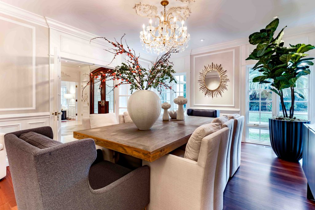 18 Cowell Lane Home in Atherton, California. Indulge in the perfect blend of privacy and luxury within the serene surroundings of this magnificent Atherton estate. Nestled on over an acre of meticulously maintained grounds, this exceptional home exudes style and elegance at every turn, boasting over 6,800 square feet of living space. Impeccable craftsmanship is showcased throughout, with exquisite details including stone, marble, and mahogany finishes. 