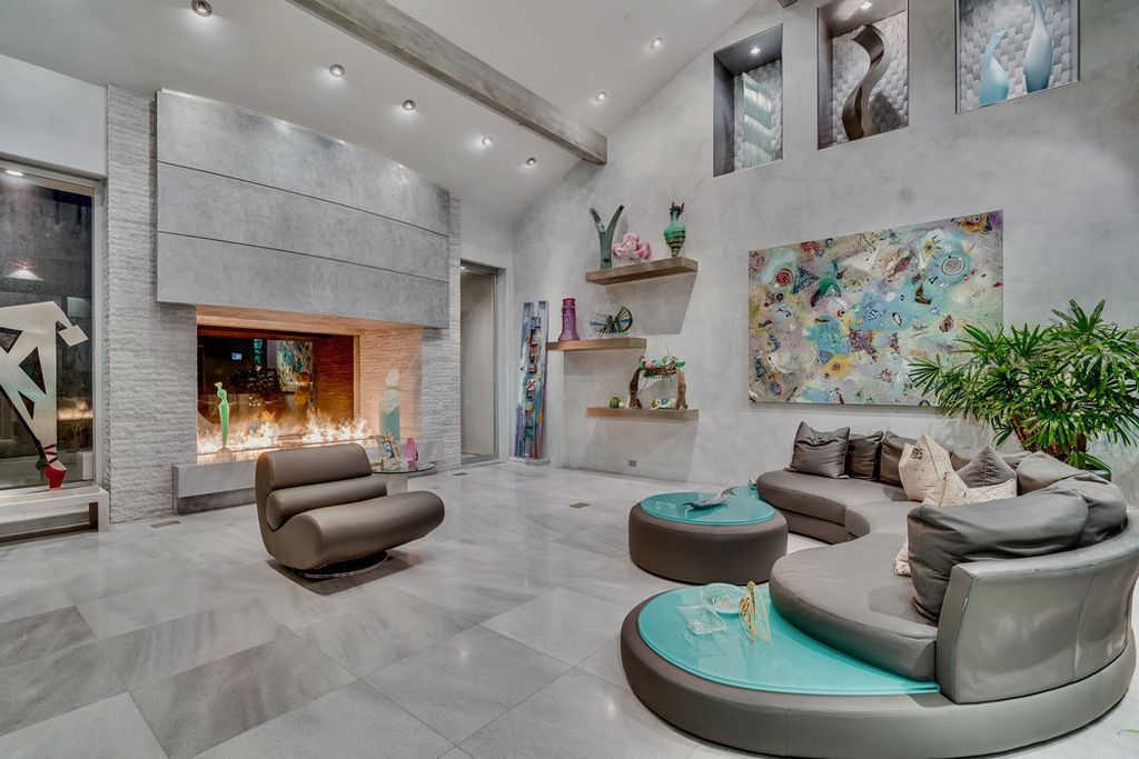 Located at 6002 Via Posada Del Norte in Rancho Santa Fe, CA, this stunning contemporary home is a dream come true. Boasting 12 bedrooms, 10 bathrooms, and a living space of 12,745 square feet, this home is truly one-of-a-kind. Built in 2006, it sits on one of the most coveted lots in the prestigious guard-gated community of Fairbanks Ranch.