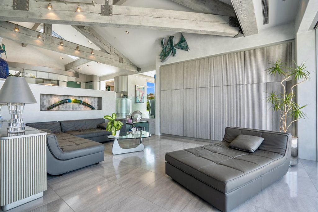 Located at 6002 Via Posada Del Norte in Rancho Santa Fe, CA, this stunning contemporary home is a dream come true. Boasting 12 bedrooms, 10 bathrooms, and a living space of 12,745 square feet, this home is truly one-of-a-kind. Built in 2006, it sits on one of the most coveted lots in the prestigious guard-gated community of Fairbanks Ranch.