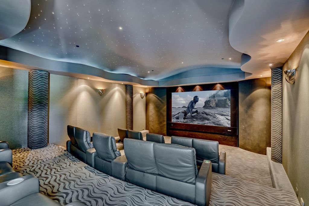 Located at 6002 Via Posada Del Norte in Rancho Santa Fe, CA, this stunning contemporary home is a dream come true. Boasting 12 bedrooms, 10 bathrooms, and a living space of 12,745 square feet, this home is truly one-of-a-kind. Built in 2006, it sits on one of the most coveted lots in the prestigious guard-gated community of Fairbanks Ranch.
