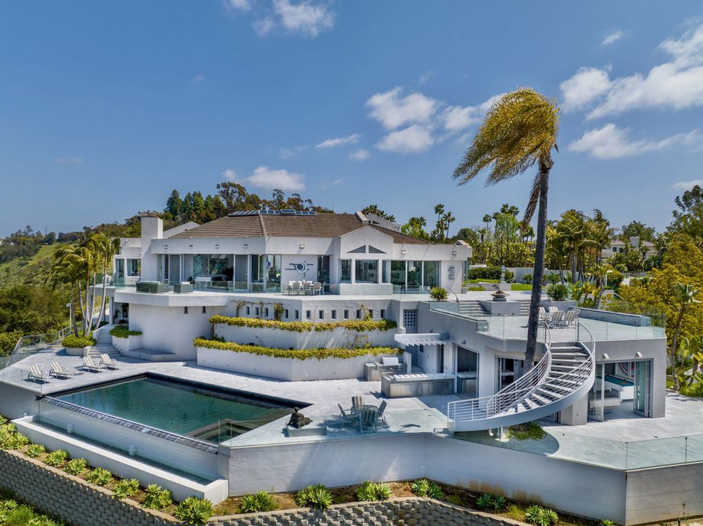Located at 6002 Via Posada Del Norte in Rancho Santa Fe, CA, this stunning contemporary home is a dream come true. Boasting 12 bedrooms, 10 bathrooms, and a living space of 12,745 square feet, this home is truly one-of-a-kind. Built in 2006, it sits on one of the most coveted lots in the prestigious guard-gated community of Fairbanks Ranch.