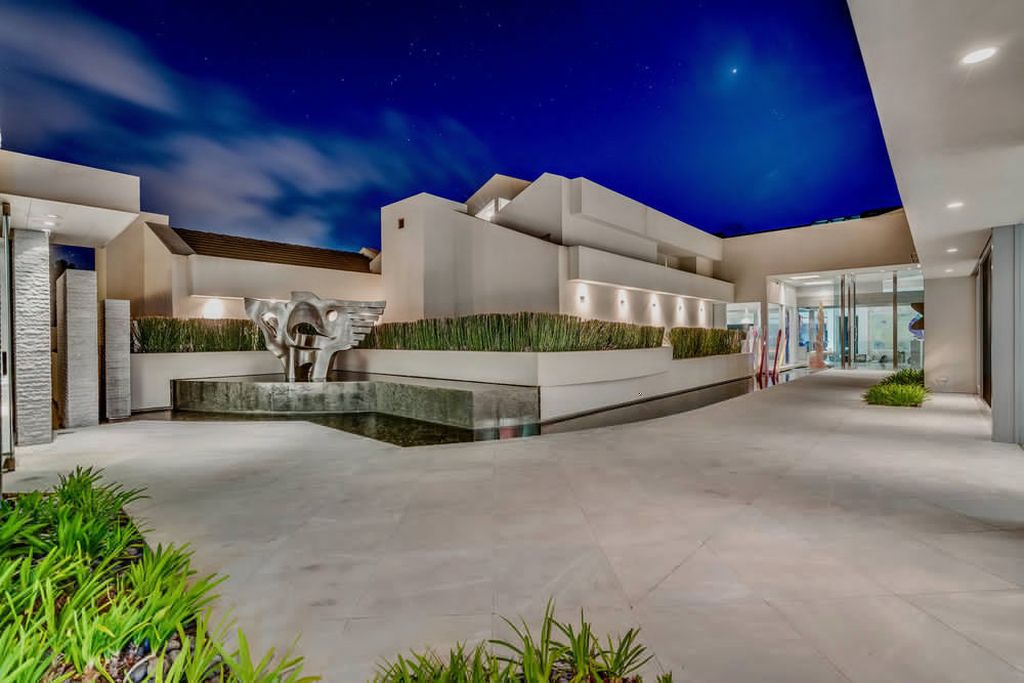 Located at 6002 Via Posada Del Norte in Rancho Santa Fe, CA, this stunning contemporary home is a dream come true. Boasting 12 bedrooms, 10 bathrooms, and a living space of 12,745 square feet, this home is truly one-of-a-kind. Built in 2006, it sits on one of the most coveted lots in the prestigious guard-gated community of Fairbanks Ranch.