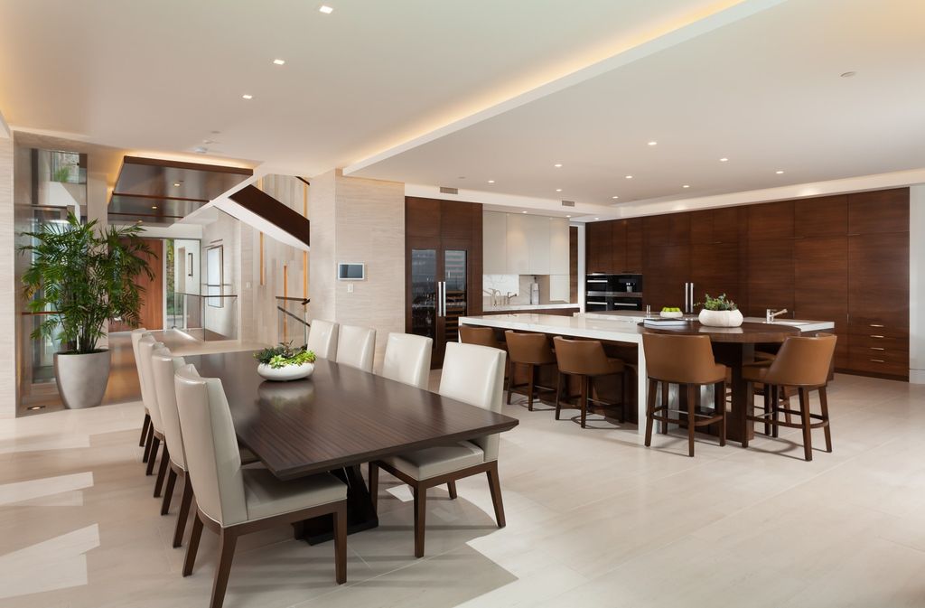 7 Strand Beach Drive in Dana Point, CA is an exquisite property that boasts breathtaking Pacific Ocean views, unparalleled contemporary architecture, and a prime location at The Strand at Headlands. Built in 2018 by Brown Brothers Construction, this modern custom showplace features approximately 9,630 square feet of living space, six ensuite bedrooms, and seven-and-a-half baths, including two primary suites and a junior suite on the top level.