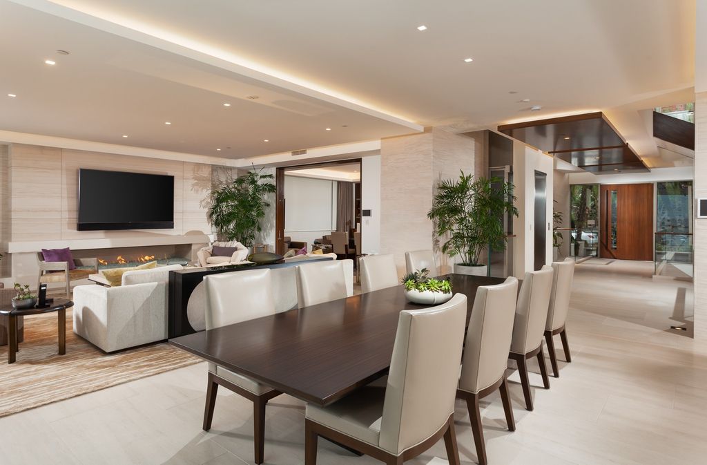 7 Strand Beach Drive in Dana Point, CA is an exquisite property that boasts breathtaking Pacific Ocean views, unparalleled contemporary architecture, and a prime location at The Strand at Headlands. Built in 2018 by Brown Brothers Construction, this modern custom showplace features approximately 9,630 square feet of living space, six ensuite bedrooms, and seven-and-a-half baths, including two primary suites and a junior suite on the top level.
