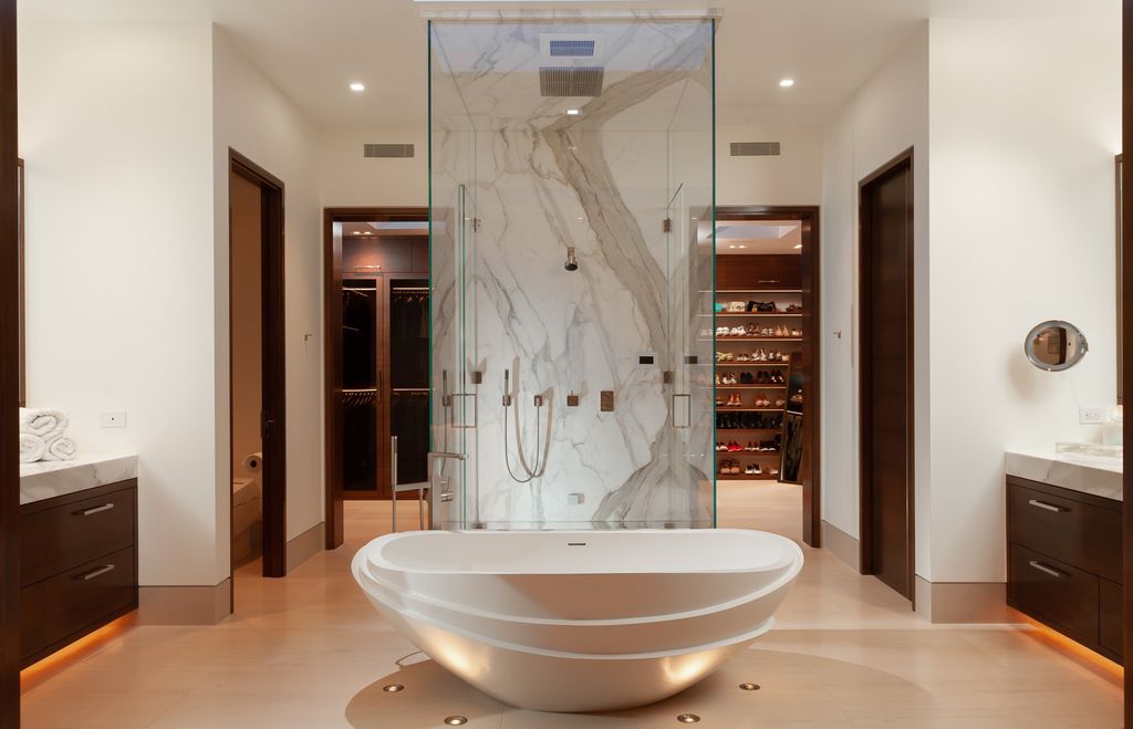 7 Strand Beach Drive in Dana Point, CA is an exquisite property that boasts breathtaking Pacific Ocean views, unparalleled contemporary architecture, and a prime location at The Strand at Headlands. Built in 2018 by Brown Brothers Construction, this modern custom showplace features approximately 9,630 square feet of living space, six ensuite bedrooms, and seven-and-a-half baths, including two primary suites and a junior suite on the top level.