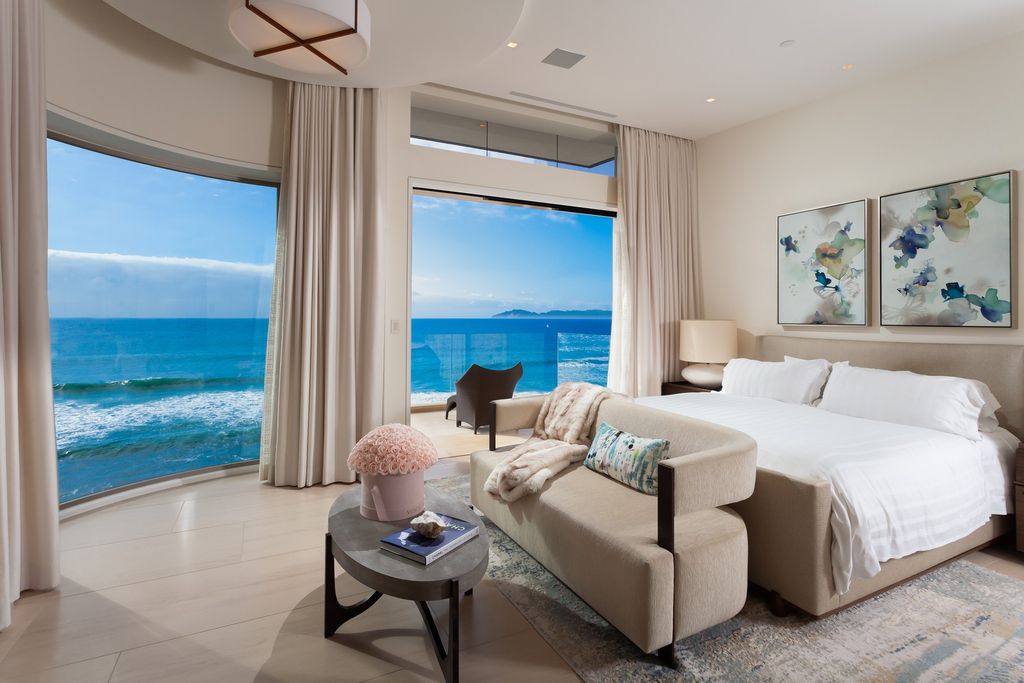 7 Strand Beach Drive in Dana Point, CA is an exquisite property that boasts breathtaking Pacific Ocean views, unparalleled contemporary architecture, and a prime location at The Strand at Headlands. Built in 2018 by Brown Brothers Construction, this modern custom showplace features approximately 9,630 square feet of living space, six ensuite bedrooms, and seven-and-a-half baths, including two primary suites and a junior suite on the top level.