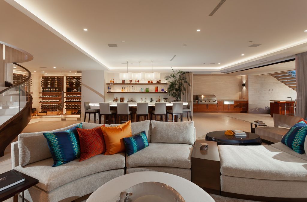 7 Strand Beach Drive in Dana Point, CA is an exquisite property that boasts breathtaking Pacific Ocean views, unparalleled contemporary architecture, and a prime location at The Strand at Headlands. Built in 2018 by Brown Brothers Construction, this modern custom showplace features approximately 9,630 square feet of living space, six ensuite bedrooms, and seven-and-a-half baths, including two primary suites and a junior suite on the top level.