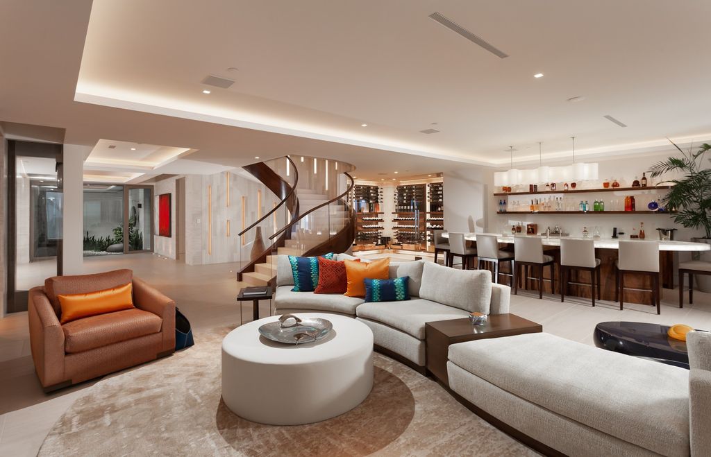 7 Strand Beach Drive in Dana Point, CA is an exquisite property that boasts breathtaking Pacific Ocean views, unparalleled contemporary architecture, and a prime location at The Strand at Headlands. Built in 2018 by Brown Brothers Construction, this modern custom showplace features approximately 9,630 square feet of living space, six ensuite bedrooms, and seven-and-a-half baths, including two primary suites and a junior suite on the top level.