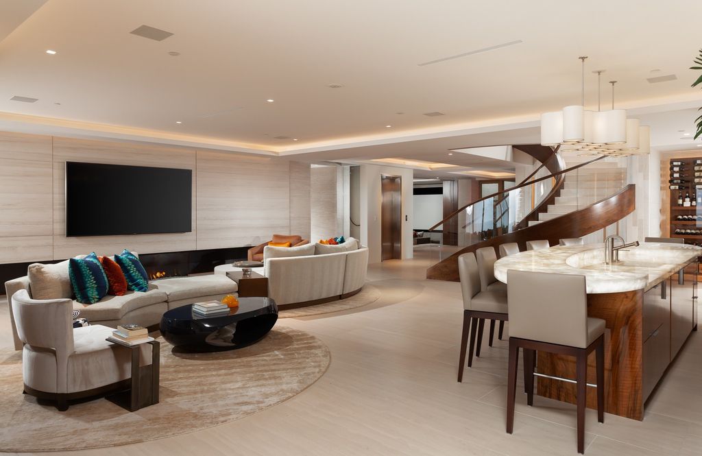 7 Strand Beach Drive in Dana Point, CA is an exquisite property that boasts breathtaking Pacific Ocean views, unparalleled contemporary architecture, and a prime location at The Strand at Headlands. Built in 2018 by Brown Brothers Construction, this modern custom showplace features approximately 9,630 square feet of living space, six ensuite bedrooms, and seven-and-a-half baths, including two primary suites and a junior suite on the top level.