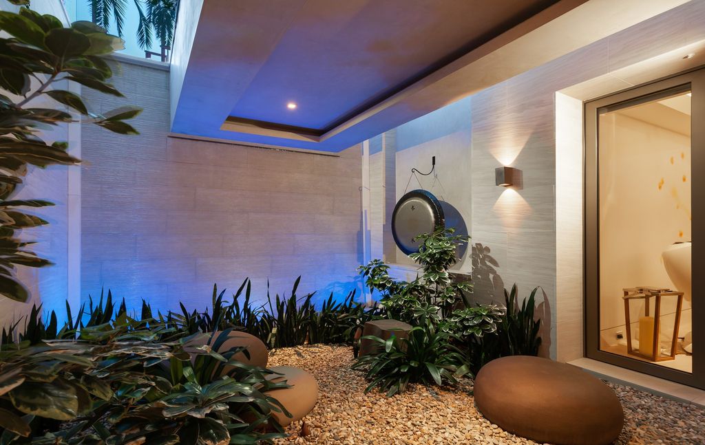 7 Strand Beach Drive in Dana Point, CA is an exquisite property that boasts breathtaking Pacific Ocean views, unparalleled contemporary architecture, and a prime location at The Strand at Headlands. Built in 2018 by Brown Brothers Construction, this modern custom showplace features approximately 9,630 square feet of living space, six ensuite bedrooms, and seven-and-a-half baths, including two primary suites and a junior suite on the top level.