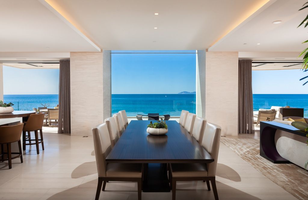 7 Strand Beach Drive in Dana Point, CA is an exquisite property that boasts breathtaking Pacific Ocean views, unparalleled contemporary architecture, and a prime location at The Strand at Headlands. Built in 2018 by Brown Brothers Construction, this modern custom showplace features approximately 9,630 square feet of living space, six ensuite bedrooms, and seven-and-a-half baths, including two primary suites and a junior suite on the top level.