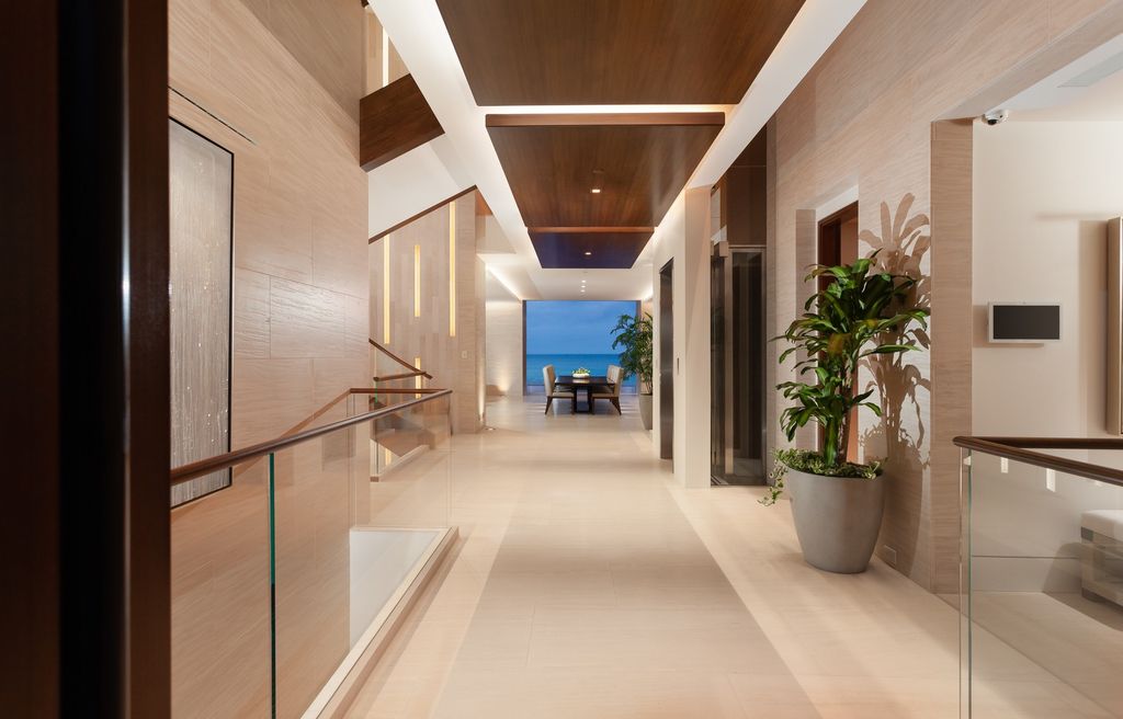 7 Strand Beach Drive in Dana Point, CA is an exquisite property that boasts breathtaking Pacific Ocean views, unparalleled contemporary architecture, and a prime location at The Strand at Headlands. Built in 2018 by Brown Brothers Construction, this modern custom showplace features approximately 9,630 square feet of living space, six ensuite bedrooms, and seven-and-a-half baths, including two primary suites and a junior suite on the top level.