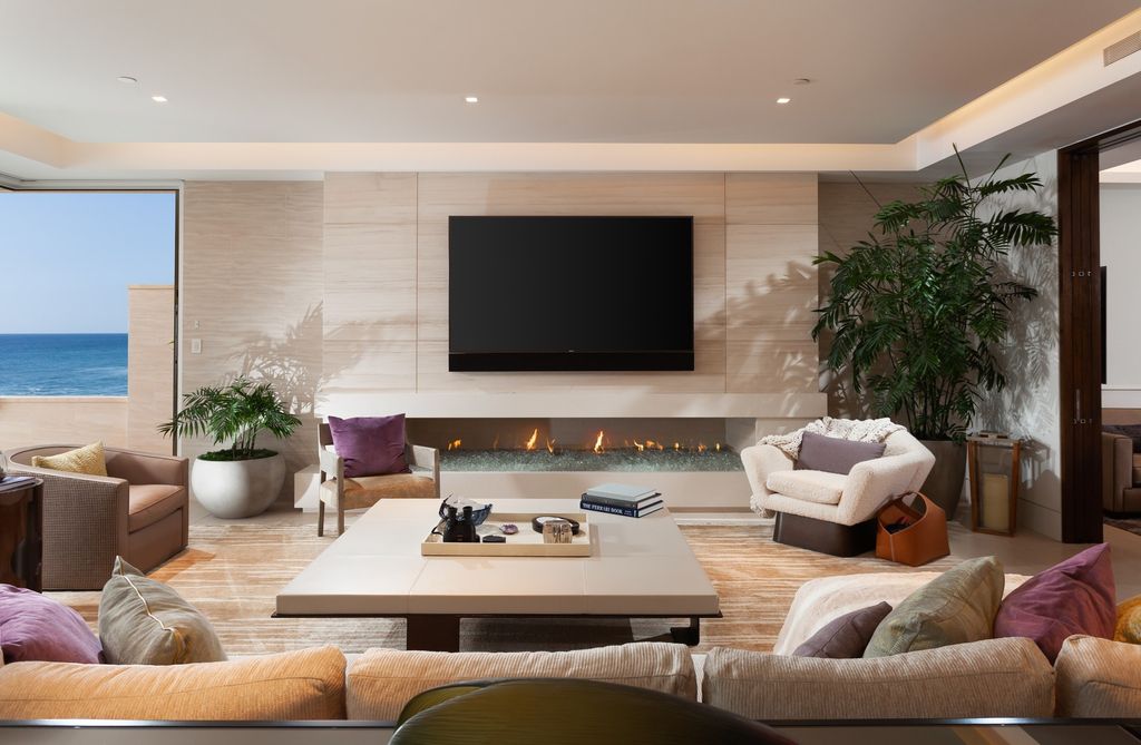 7 Strand Beach Drive in Dana Point, CA is an exquisite property that boasts breathtaking Pacific Ocean views, unparalleled contemporary architecture, and a prime location at The Strand at Headlands. Built in 2018 by Brown Brothers Construction, this modern custom showplace features approximately 9,630 square feet of living space, six ensuite bedrooms, and seven-and-a-half baths, including two primary suites and a junior suite on the top level.