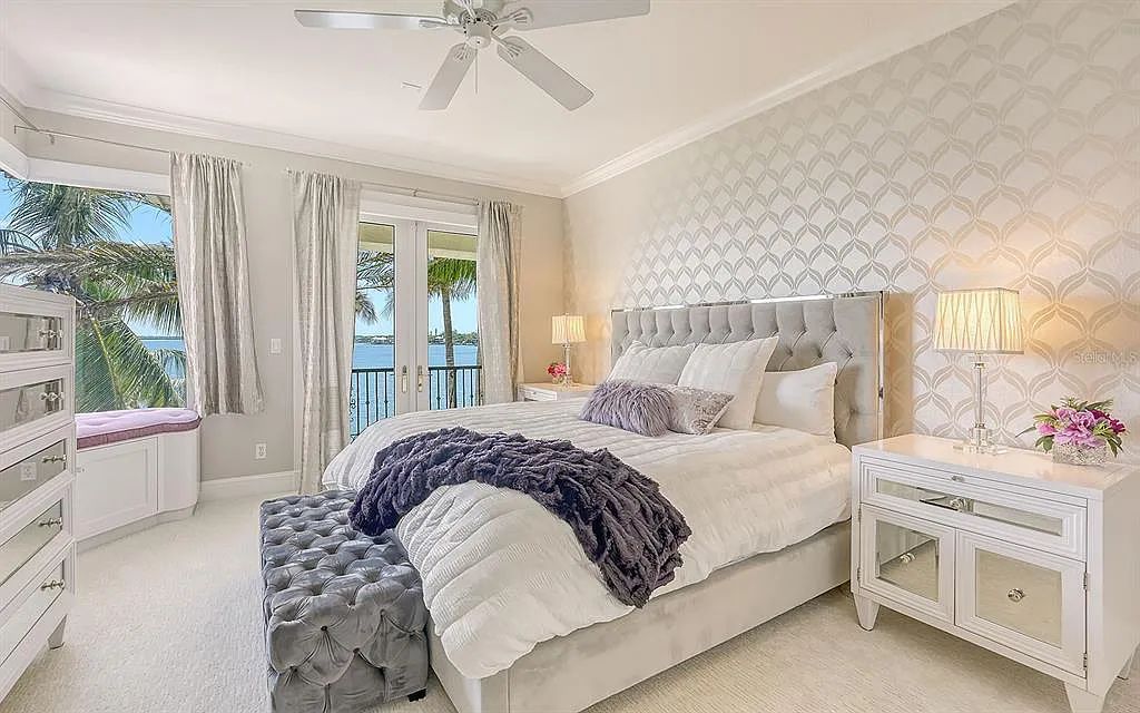 Welcome to a stunning Siesta Key coastal home 1414 Point Crisp Road, Sarasota, Florida with 360-degree bay views and 546 feet of waterfront on Little Sarasota Bay. This 6-bed, 9-bath home boasts 7,162 sqft of living space on 1.22 acres of land.