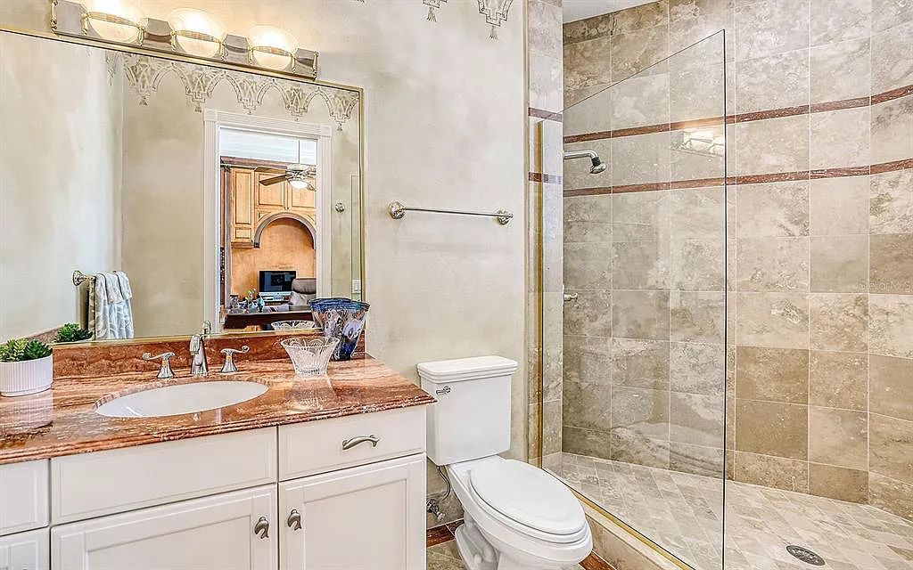 Welcome to a stunning Siesta Key coastal home 1414 Point Crisp Road, Sarasota, Florida with 360-degree bay views and 546 feet of waterfront on Little Sarasota Bay. This 6-bed, 9-bath home boasts 7,162 sqft of living space on 1.22 acres of land.
