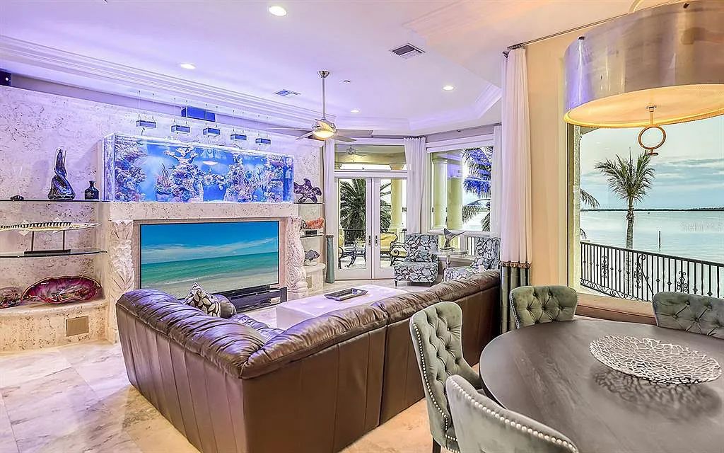 Welcome to a stunning Siesta Key coastal home 1414 Point Crisp Road, Sarasota, Florida with 360-degree bay views and 546 feet of waterfront on Little Sarasota Bay. This 6-bed, 9-bath home boasts 7,162 sqft of living space on 1.22 acres of land.