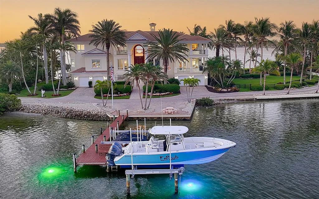Welcome to a stunning Siesta Key coastal home 1414 Point Crisp Road, Sarasota, Florida with 360-degree bay views and 546 feet of waterfront on Little Sarasota Bay. This 6-bed, 9-bath home boasts 7,162 sqft of living space on 1.22 acres of land.