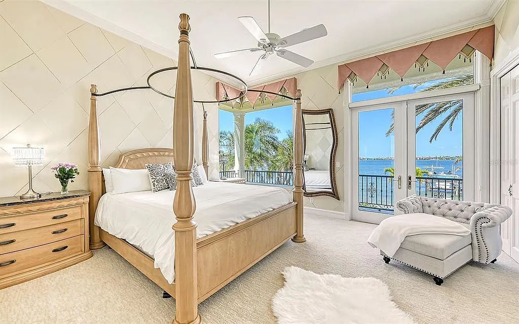 Welcome to a stunning Siesta Key coastal home 1414 Point Crisp Road, Sarasota, Florida with 360-degree bay views and 546 feet of waterfront on Little Sarasota Bay. This 6-bed, 9-bath home boasts 7,162 sqft of living space on 1.22 acres of land.