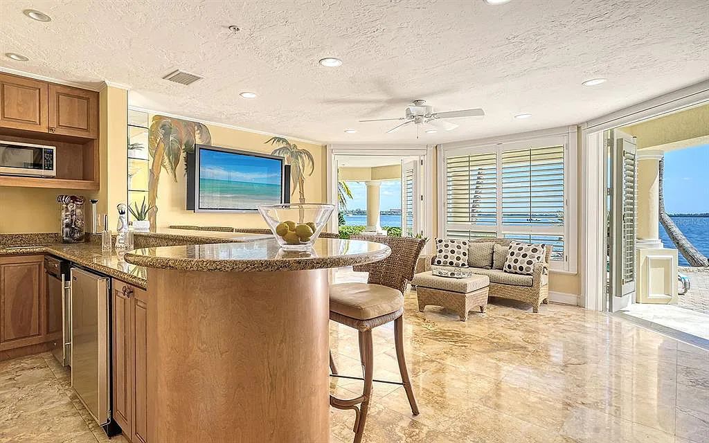 Welcome to a stunning Siesta Key coastal home 1414 Point Crisp Road, Sarasota, Florida with 360-degree bay views and 546 feet of waterfront on Little Sarasota Bay. This 6-bed, 9-bath home boasts 7,162 sqft of living space on 1.22 acres of land.