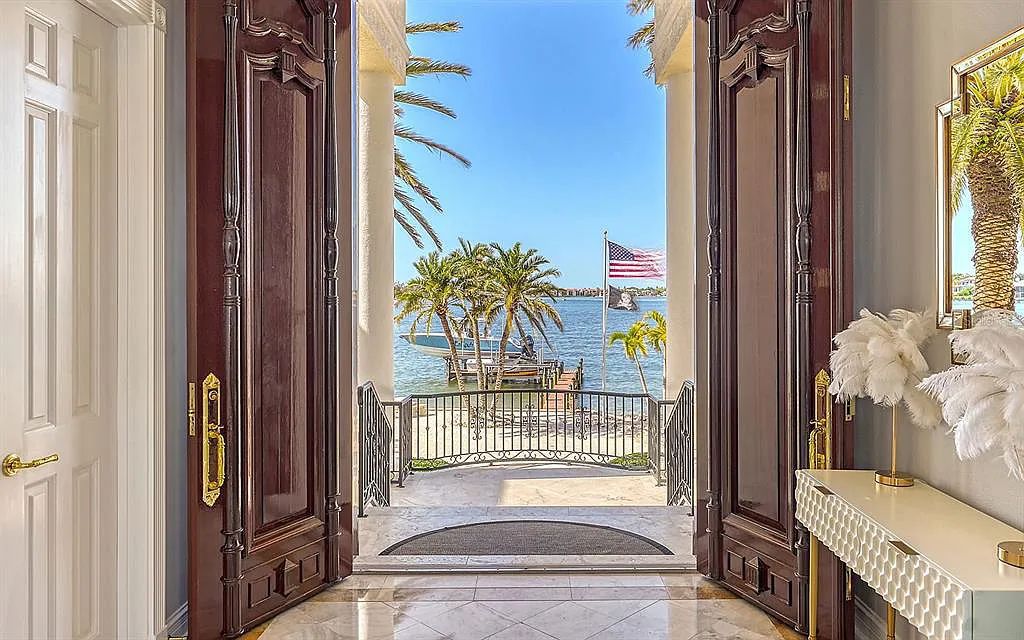 Welcome to a stunning Siesta Key coastal home 1414 Point Crisp Road, Sarasota, Florida with 360-degree bay views and 546 feet of waterfront on Little Sarasota Bay. This 6-bed, 9-bath home boasts 7,162 sqft of living space on 1.22 acres of land.