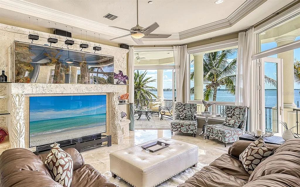Welcome to a stunning Siesta Key coastal home 1414 Point Crisp Road, Sarasota, Florida with 360-degree bay views and 546 feet of waterfront on Little Sarasota Bay. This 6-bed, 9-bath home boasts 7,162 sqft of living space on 1.22 acres of land.
