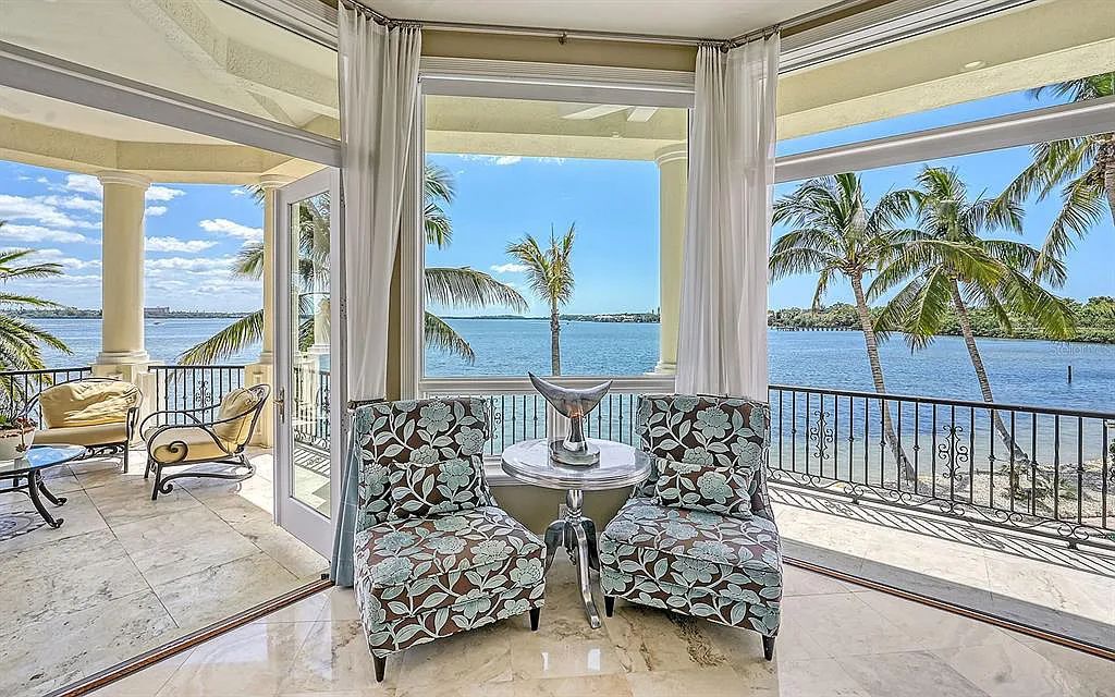 Welcome to a stunning Siesta Key coastal home 1414 Point Crisp Road, Sarasota, Florida with 360-degree bay views and 546 feet of waterfront on Little Sarasota Bay. This 6-bed, 9-bath home boasts 7,162 sqft of living space on 1.22 acres of land.