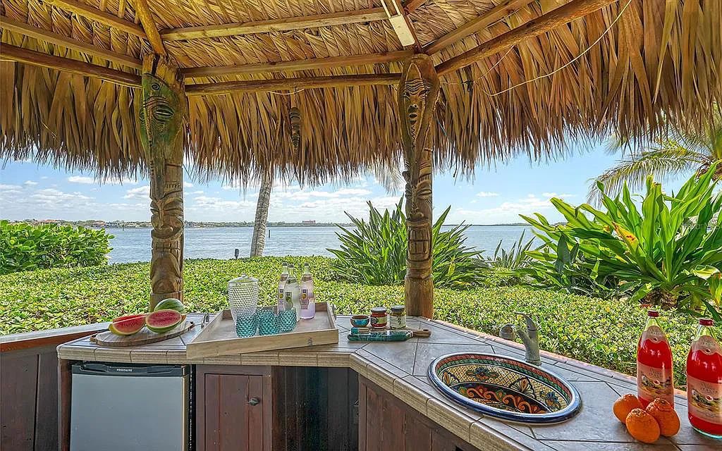 Welcome to a stunning Siesta Key coastal home 1414 Point Crisp Road, Sarasota, Florida with 360-degree bay views and 546 feet of waterfront on Little Sarasota Bay. This 6-bed, 9-bath home boasts 7,162 sqft of living space on 1.22 acres of land.