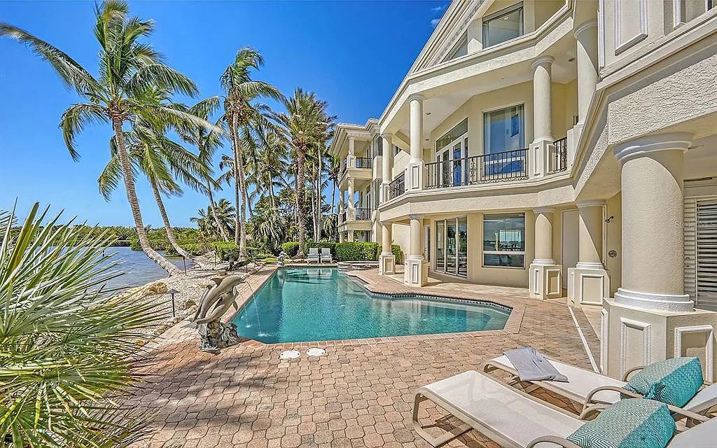 Welcome to a stunning Siesta Key coastal home 1414 Point Crisp Road, Sarasota, Florida with 360-degree bay views and 546 feet of waterfront on Little Sarasota Bay. This 6-bed, 9-bath home boasts 7,162 sqft of living space on 1.22 acres of land.