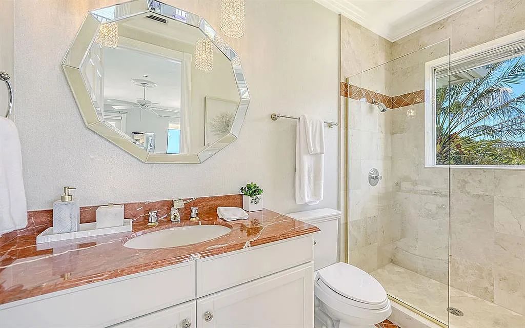 Welcome to a stunning Siesta Key coastal home 1414 Point Crisp Road, Sarasota, Florida with 360-degree bay views and 546 feet of waterfront on Little Sarasota Bay. This 6-bed, 9-bath home boasts 7,162 sqft of living space on 1.22 acres of land.