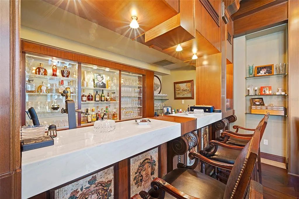 Discover the ultimate in luxury living at 4852 S Peninsula Drive in Ponce Inlet, Florida. This privately gated 3-acre waterfront estate boasts 6 bedrooms, 9 bathrooms, 12,126 sq ft of living space, and a 2.80-acre lot size built in 2004.