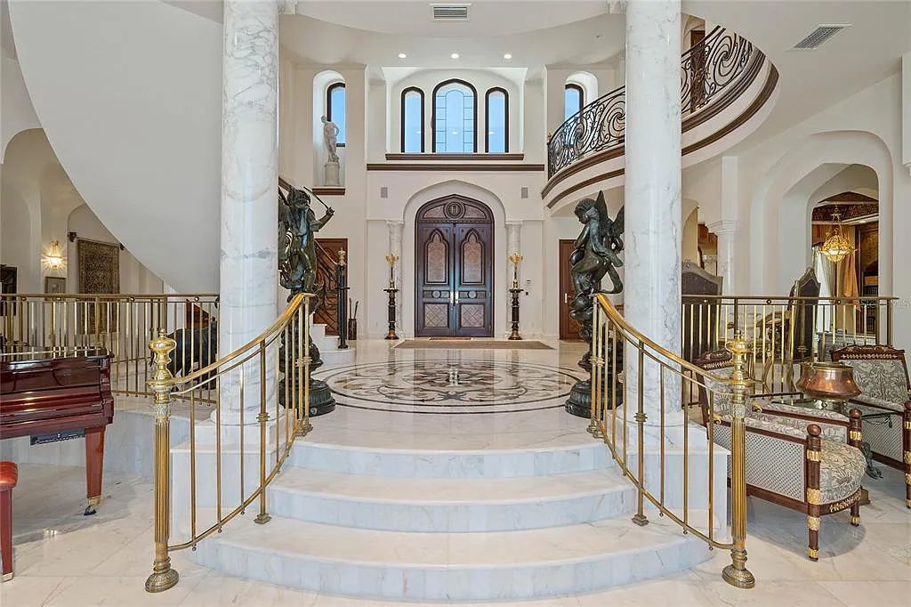 Discover the ultimate in luxury living at 4852 S Peninsula Drive in Ponce Inlet, Florida. This privately gated 3-acre waterfront estate boasts 6 bedrooms, 9 bathrooms, 12,126 sq ft of living space, and a 2.80-acre lot size built in 2004.