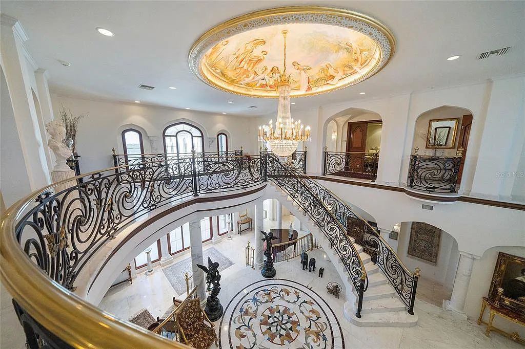 Discover the ultimate in luxury living at 4852 S Peninsula Drive in Ponce Inlet, Florida. This privately gated 3-acre waterfront estate boasts 6 bedrooms, 9 bathrooms, 12,126 sq ft of living space, and a 2.80-acre lot size built in 2004.