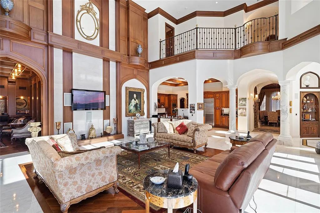 Discover the ultimate in luxury living at 4852 S Peninsula Drive in Ponce Inlet, Florida. This privately gated 3-acre waterfront estate boasts 6 bedrooms, 9 bathrooms, 12,126 sq ft of living space, and a 2.80-acre lot size built in 2004.