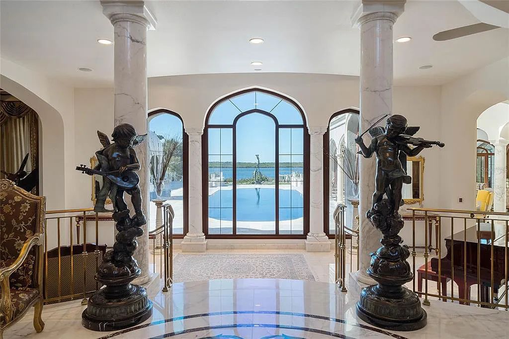 Discover the ultimate in luxury living at 4852 S Peninsula Drive in Ponce Inlet, Florida. This privately gated 3-acre waterfront estate boasts 6 bedrooms, 9 bathrooms, 12,126 sq ft of living space, and a 2.80-acre lot size built in 2004.