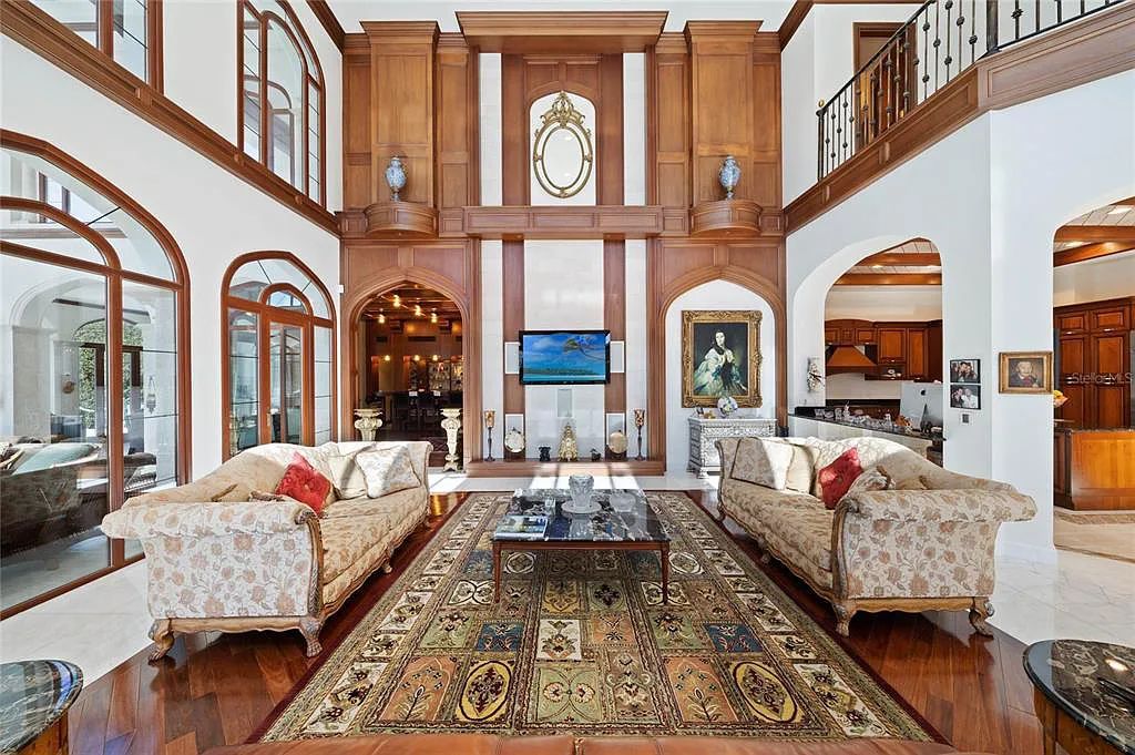 Discover the ultimate in luxury living at 4852 S Peninsula Drive in Ponce Inlet, Florida. This privately gated 3-acre waterfront estate boasts 6 bedrooms, 9 bathrooms, 12,126 sq ft of living space, and a 2.80-acre lot size built in 2004.