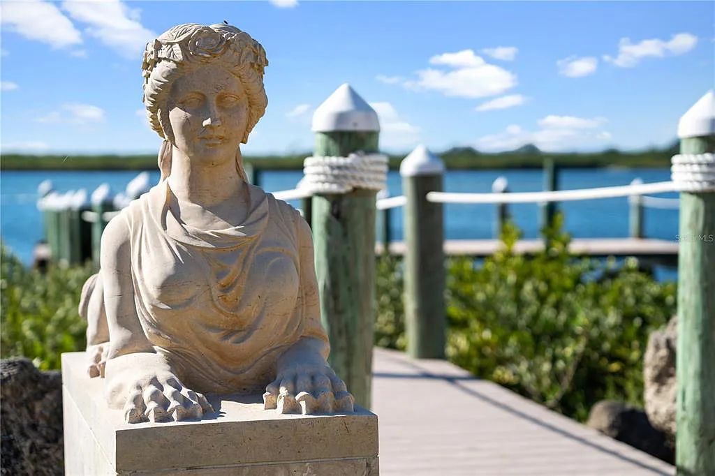 Discover the ultimate in luxury living at 4852 S Peninsula Drive in Ponce Inlet, Florida. This privately gated 3-acre waterfront estate boasts 6 bedrooms, 9 bathrooms, 12,126 sq ft of living space, and a 2.80-acre lot size built in 2004.