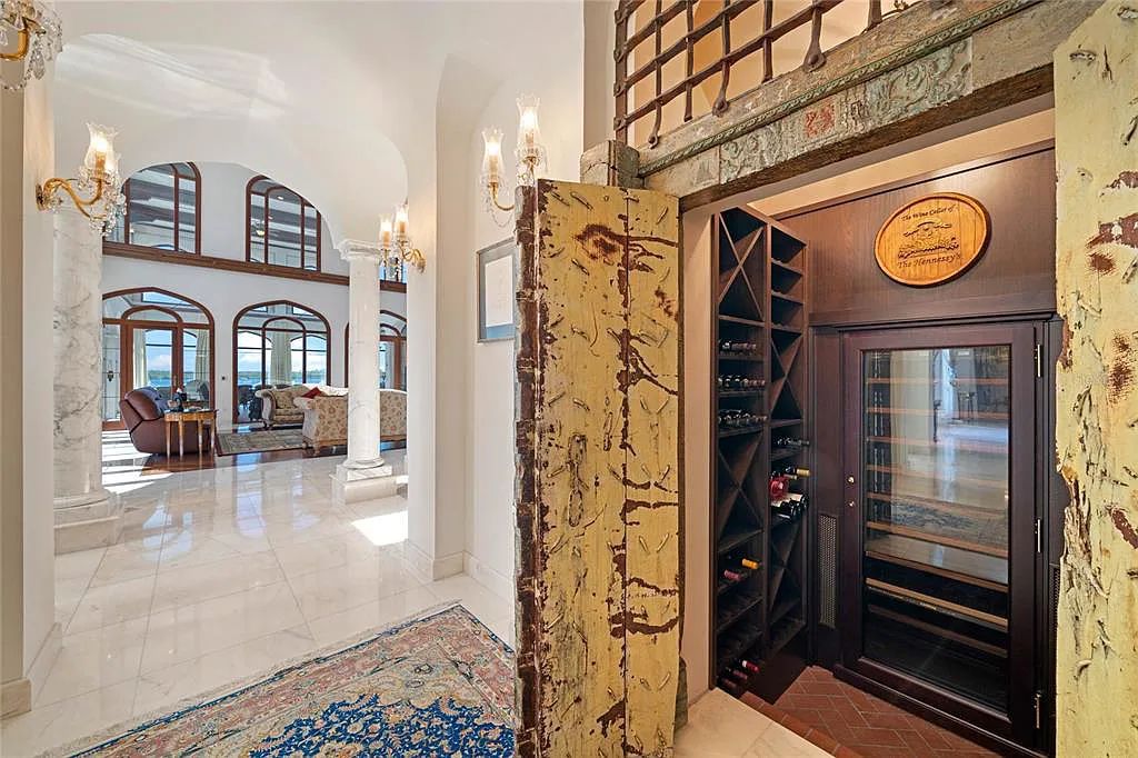 Discover the ultimate in luxury living at 4852 S Peninsula Drive in Ponce Inlet, Florida. This privately gated 3-acre waterfront estate boasts 6 bedrooms, 9 bathrooms, 12,126 sq ft of living space, and a 2.80-acre lot size built in 2004.