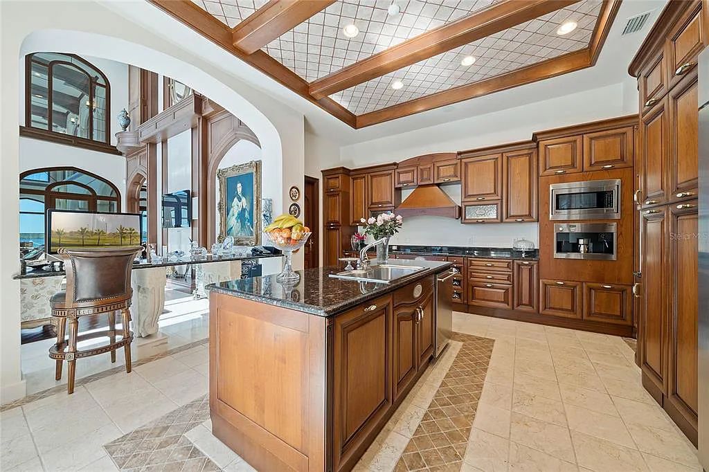 Discover the ultimate in luxury living at 4852 S Peninsula Drive in Ponce Inlet, Florida. This privately gated 3-acre waterfront estate boasts 6 bedrooms, 9 bathrooms, 12,126 sq ft of living space, and a 2.80-acre lot size built in 2004.