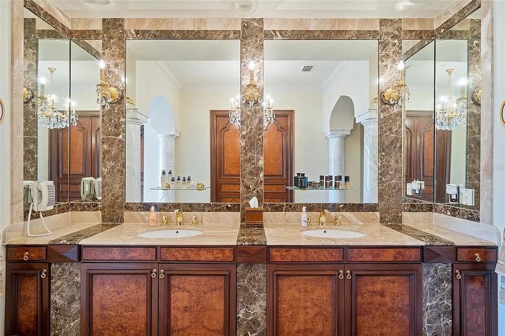 Discover the ultimate in luxury living at 4852 S Peninsula Drive in Ponce Inlet, Florida. This privately gated 3-acre waterfront estate boasts 6 bedrooms, 9 bathrooms, 12,126 sq ft of living space, and a 2.80-acre lot size built in 2004.