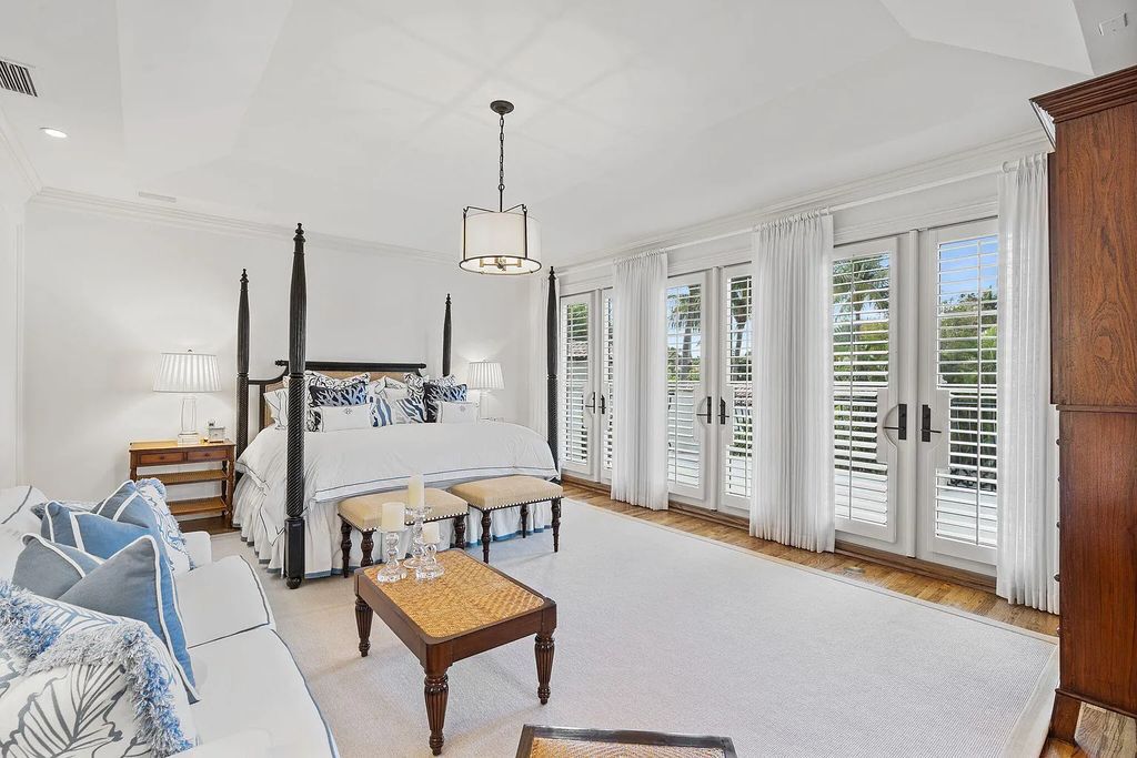 Experience luxury living at its finest in Palm Beach, Florida with this stunning Mediterranean estate on 224 Barton Avenue. The fully furnished home features 4 bedrooms, 5 bathrooms, and over 6,387 sqft of living space, complete with a custom gourmet kitchen and butler's pantry.