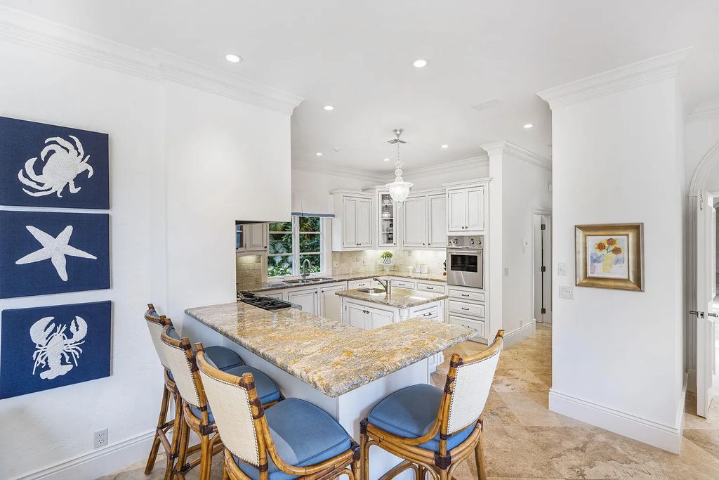 Experience luxury living at its finest in Palm Beach, Florida with this stunning Mediterranean estate on 224 Barton Avenue. The fully furnished home features 4 bedrooms, 5 bathrooms, and over 6,387 sqft of living space, complete with a custom gourmet kitchen and butler's pantry.